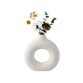 Elegant Ceramic Hollow Circle Vase with Dried Flowers